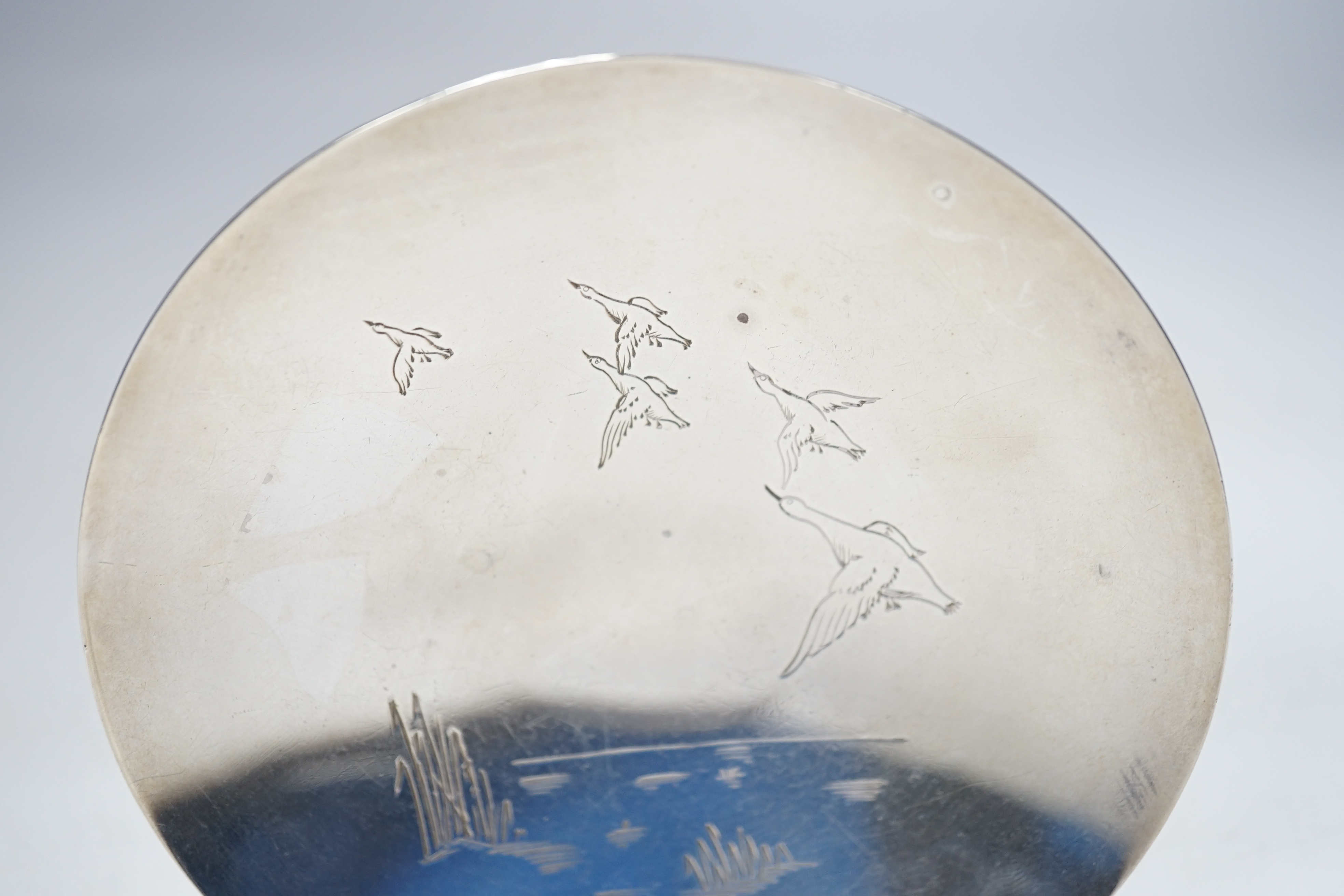 An Elizabeth II silver pedestal trinket bowl, engraved with ducks in flight, Mappin & Webb, Sheffield 1964, 142 grams